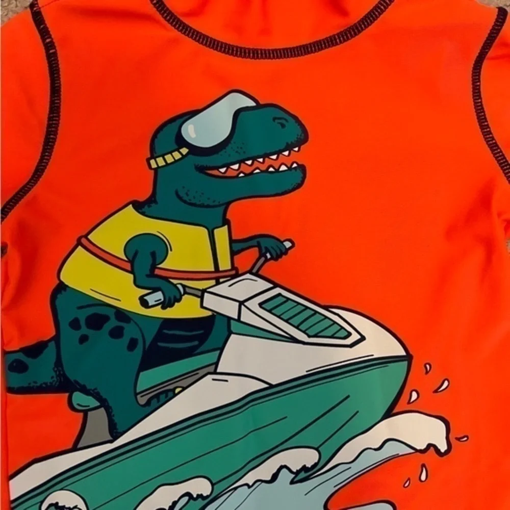 Carter's Swim Shirt boy's size 2T Orange Dinosaur Pool Rashguard
